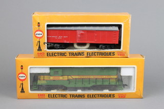 A Cox O scale electric model diesel locomotive and an Electriques train set boxed