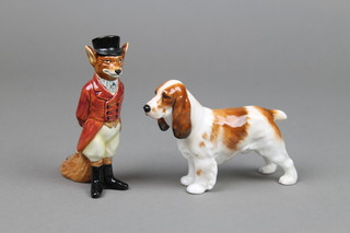 2 Royal Doulton figures - a fox in a hunting outfit D6648 4" and a Cocker Spaniel HN1037 4" 