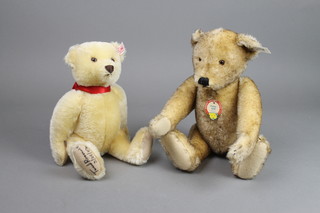 A Steiff limited edition 1928 replica teddybear - Petsey  11" with certificate, a yellow Steiff Centenary bear with signature stitched to paw, T Roosevelt 2/24/02