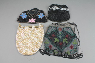 3 French black bead work evening bags and a white bead work evening bag