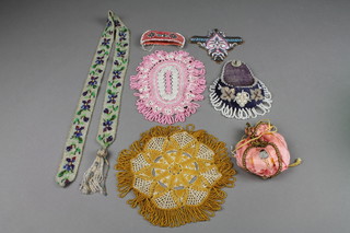 A bead work wall pocket 5 1/2", an oval bead work doily 7", ditto circular 6", bead work book mark etc  