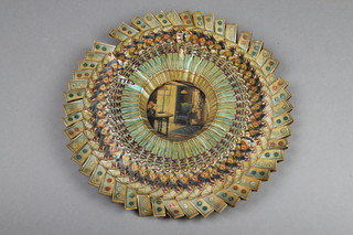 A circular paper dish formed from various packets of Players cigarettes 12" 