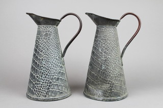 A pair of copper waisted cylindrical jugs 11 1/2"  