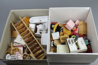 2 boxes containing a collection of dolls house furniture