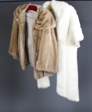 A lady's light fur jacket by Neal of Belgravia and Wimbledon together with a white fur stole 
