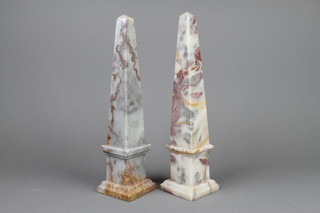 A pair of marble obelisks