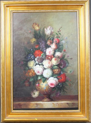 20th Century oil painting, a Continental still life study of an urn of spring flowers on a marble shelf, unsigned, 35 1/2" x 23 1/2" 