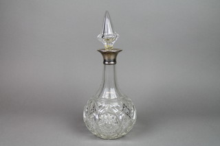 A silver collared cut glass mallet decanter with tapered stopper, London 1956