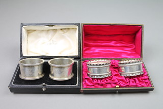 2 pairs of cased silver napkin rings, Sheffield 1950 and Birmingham 1910, approx 118 grams