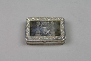 A George III silver rounded rectangular snuff box with Masonic decoration within a formal scrolling border, London 1913, maker Joseph Ash, approx. 146 grams, 3" x 2" 