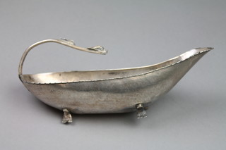 A Continental white metal sauce boat with dragon handle, approx 364 grams