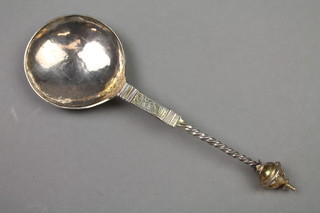 A 17th Century Dutch silver spoon with plain bowl and chased stem with spiral end and orb finial 6 1/2", approx. 34 grams