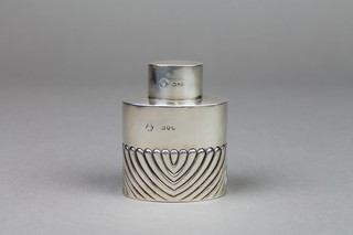 A Victorian silver oval tea caddy with demi fluted decoration, London 1895, 3", approx. 48 grams