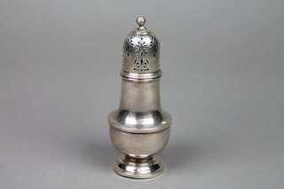 A Georgian design silver sugar shaker with high domed lid, Birmingham 1958, approx 144 grams