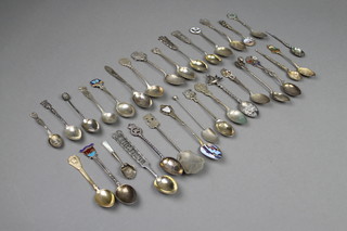 17 silver souvenir spoons, a ditto shovel with mother of pearl handle and minor plated spoons, approx 198 grams