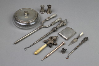 An Edwardian novelty silver and mother of pearl bookmark in the shape of a trowel, a silver mounted powder bowl and minor items