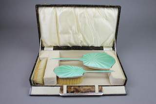 A silver and green guilloche enamel 4 piece brush set