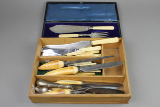 A 3 piece carving set with horn handles, a cased pair of silver plated fish servers cased and minor cutlery