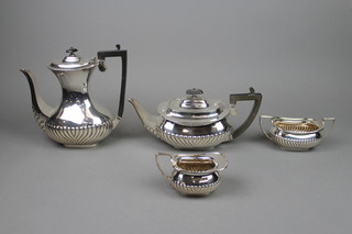 A silver plated 4 piece tea/coffee set with demi-fluted decoration