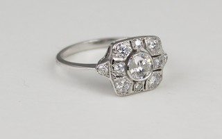 An 18ct white gold Art Deco style open diamond ring, size M 1/2