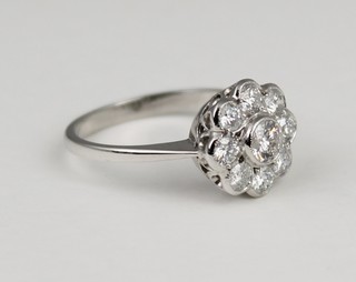 An 18ct white gold 9 stone diamond cluster ring, approx 0.95ct, size N 1/2 