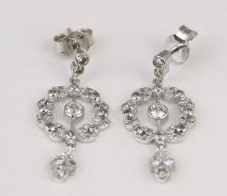 A pair of 18ct white gold Edwardian style open drop floral ear studs, approx. 0.8ct