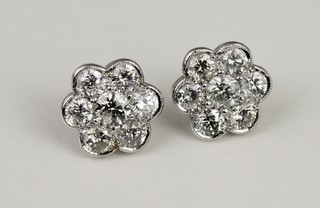 A pair of 18ct white gold 7 stone diamond cluster ear studs, approx. 3.5ct