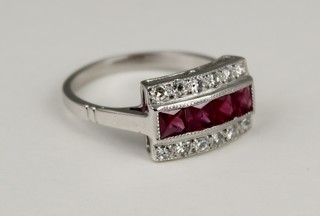 An 18ct white gold ruby and diamond cocktail ring, size L 1/2