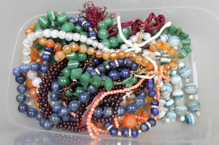 A collection of hardstone and other bead necklaces
