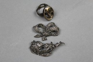 A stylish Continental silver free form ring, 2 marcasite brooches