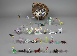 A quantity of glass animals and flowers