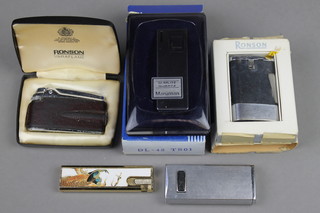 A boxed Ronson cigarette lighter and 4 others