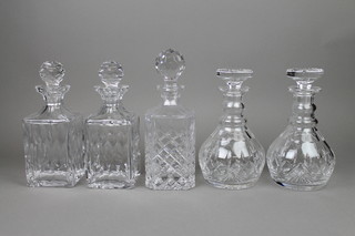 A pair of Stuart Crystal mallet decanters with mushroom stoppers 9", a pair of square ditto and a single 