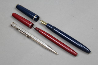 A blue Parker Duofold fountain pen, 1 other 