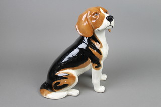 A large Beswick figure of a seated Beagle .300 12" 
