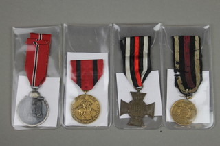 A German Franco Prussian war medal 1870-1871 and 3 others