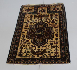 A Persian Belouche white ground prayer rug 58" x 35" 