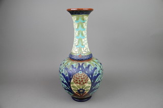 A Burmantofts faience baluster vase with waisted neck decorated with stylised flowers and motifs 19", drilled  