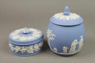 A modern Wedgwood Jasper biscuit barrel and cover, the blue ground with a panel of classical figures 7" and a ditto circular box and cover