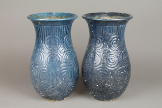 A pair of blue glazed baluster vases with geometric decoration 12"