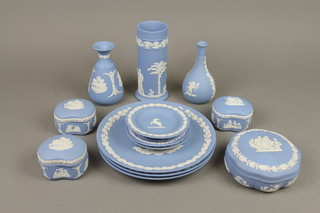 A collection of modern Wedgwood blue Jasperware comprising 3 vases, 4 boxes and lids, 4 dishes and 3 plates