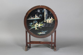 A circular Chinese rosewood and lacquered folding table/fire screen, the top with inlaid panel decorating court scenes 21 1/2"h x 24" diam.  
