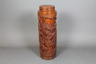 A cylindrical Chinese carved rosewood pedestal decorated figures 36"h x 14" diam. 
