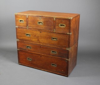A 19th Century teak and brass banded secretaire military chest, fitted a secretaire drawer flanked by 2 short drawers above 3 long drawers 37"h x 39"w x 19"d