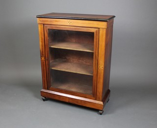 A Victorian inlaid mahogany pier cabinet, fitted shelves enclosed by glazed panelled doors, raised on turned supports 41 1/2"h x 31"w x 14"d 