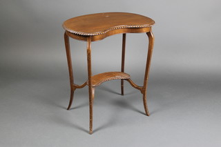 An Edwardian Chippendale style mahogany kidney shaped 2 tier occasional table with gadrooned border, raised on outswept supports 29"h x 26"w x 16"d 
