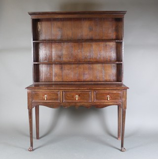 An 18th Century oak dresser, the raised back with moulded cornice above 3 shelves, the base fitted 3 drawers, raised on club supports 67"h x 48"w x 18"d 
