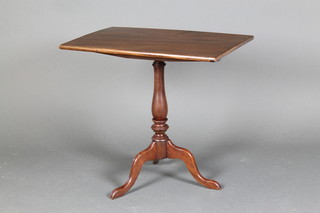 A 19th Century rectangular snap top tea/wine table, raised on a turned column and tripod base 32"h x 24"w x 16"d 