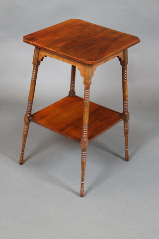 An Edwardian square walnut 2 tier occasional table raised on turned supports 26"h x 15 1/2"w x 16"d 