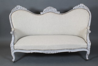 A 19th Century French carved wooden show frame sofa of serpentine outline, grey painted, raised on cabriole supports, 40"h x 61"w 